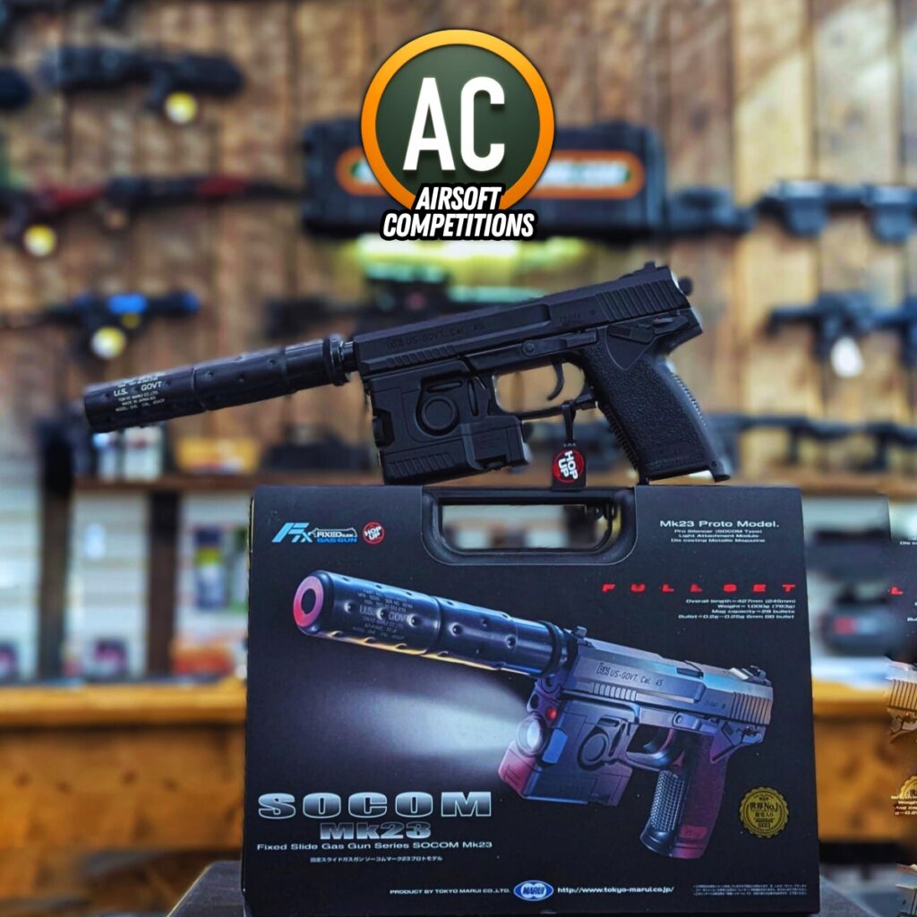 Tokyo Marui SOCOM MK23 gas pistol airsoft sidearm displayed with suppressor